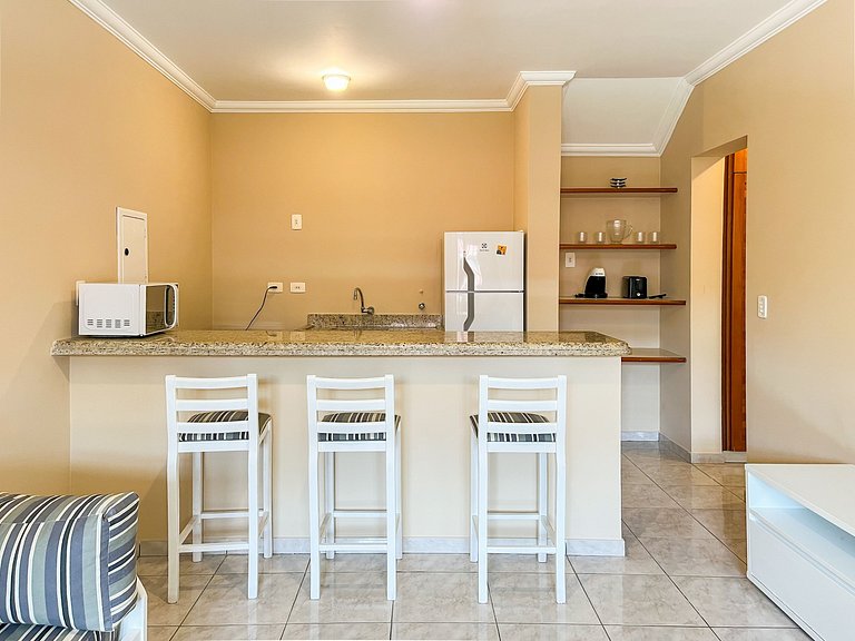 Riviera | Aconchegante Flat com Enxoval Completo